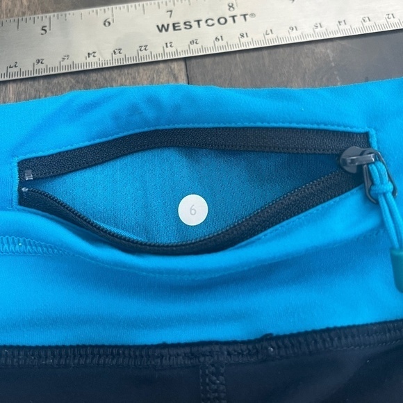 Lululemon Navy with Blue Band and back Pocket Crop Leggings - Picture 6 of 7